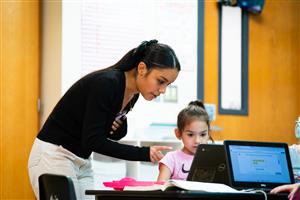 Future Teacher helping students